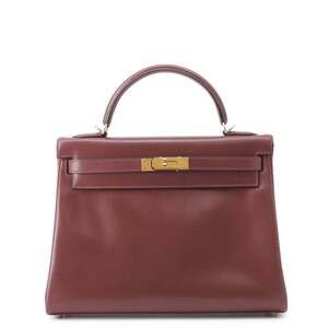 Hermès Kelly 32 handbag, in rouge ash box calf leather with an E stamp, two-w...